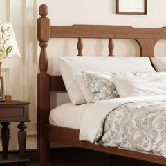 Solid bamboo platform bed with square cutout headboard in bedroom