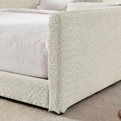 Teddy boucle fabric close‑up, upholstered side safety rail of full size kids bed frame, cream white texture view