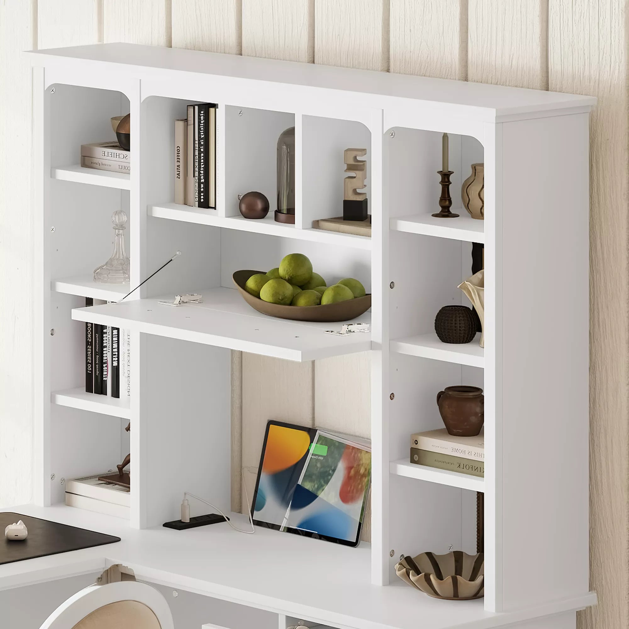 White desk hutch with books and decorative items arranged in open compartments