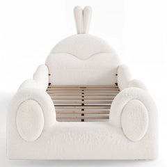 White upholstered toddler bed with rabbit ears headboard front view