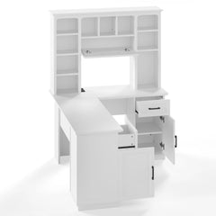 View along the white desk work surface toward the storage hutch