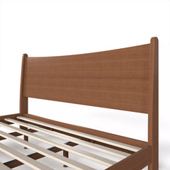 Curved headboard detail on solid bamboo platform bed