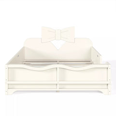 Front view white kids platform bed with decorative bow headboard and wooden slat support system