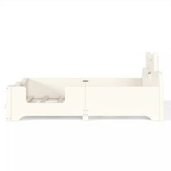 Long side profile of white wooden kids bed frame with full surrounding safety guardrails