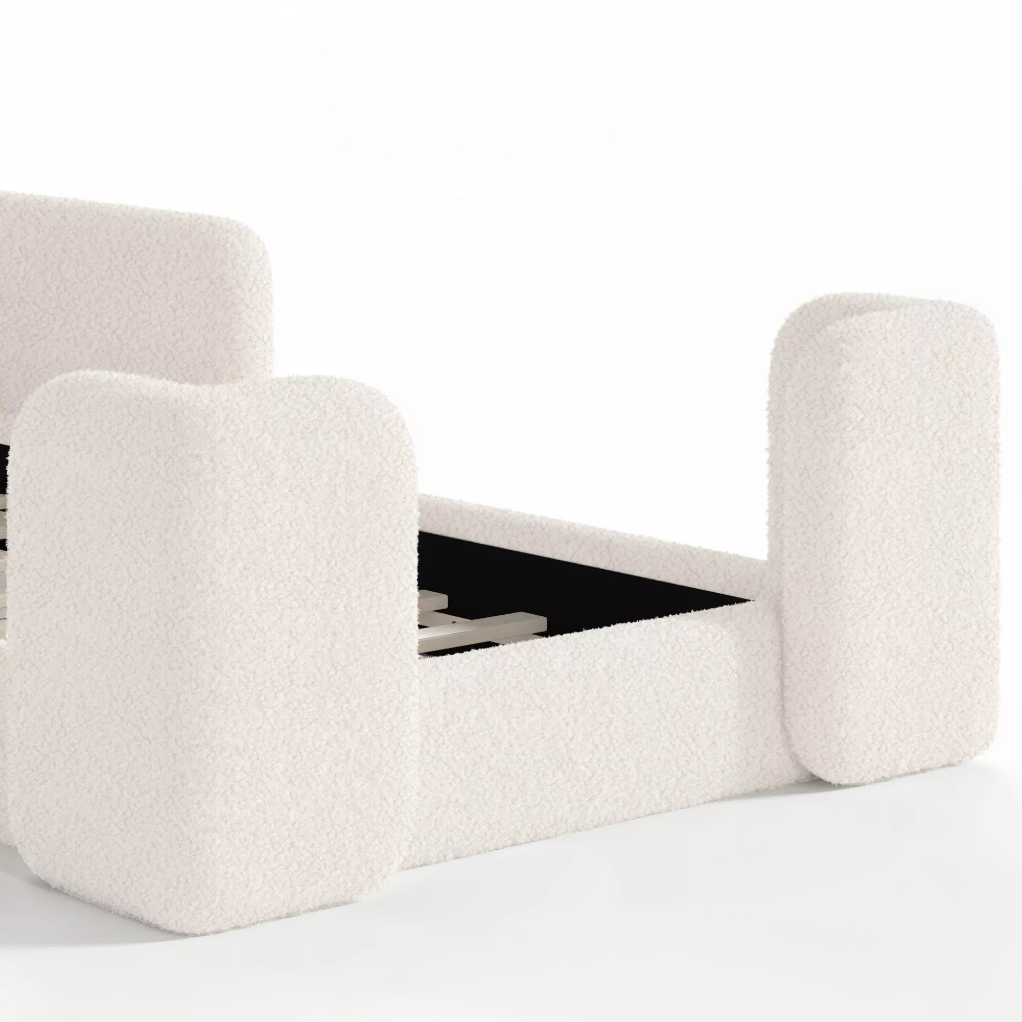 Side view of upholstered floor bed for children