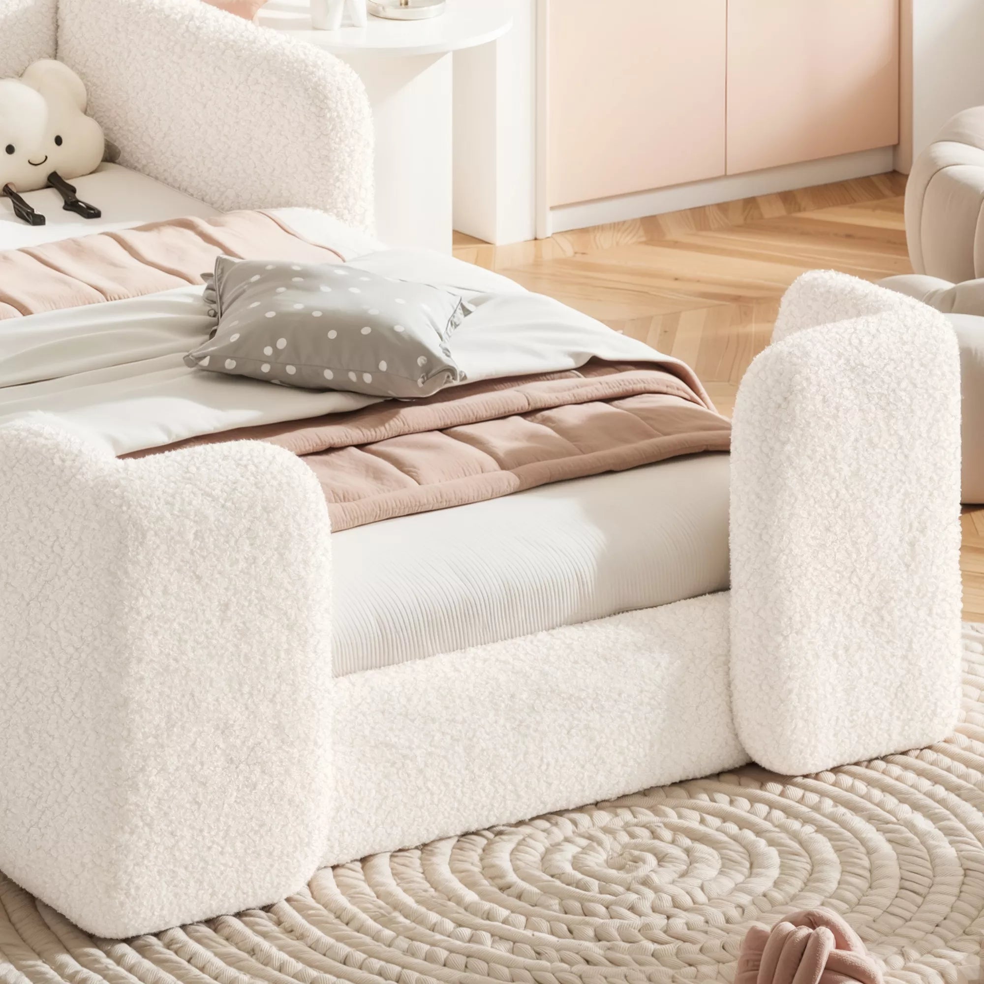 Upholstered floor bed with plush safety side rails