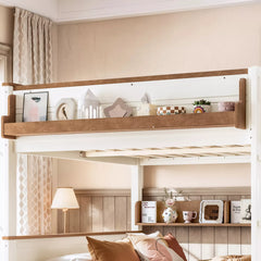 Storage shelf detail on wood bunk bed upper bunk
