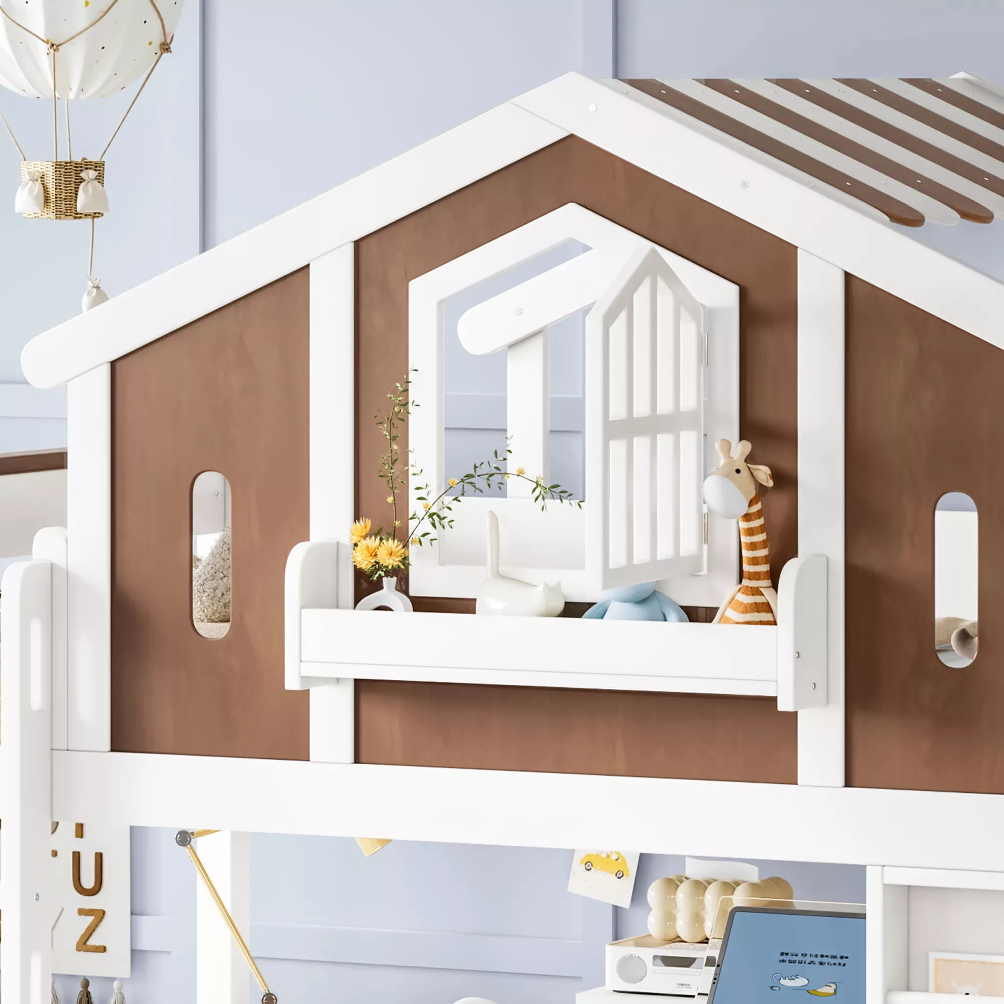 Close-up of the upper house loft bed frame with pitched roof and decorative window