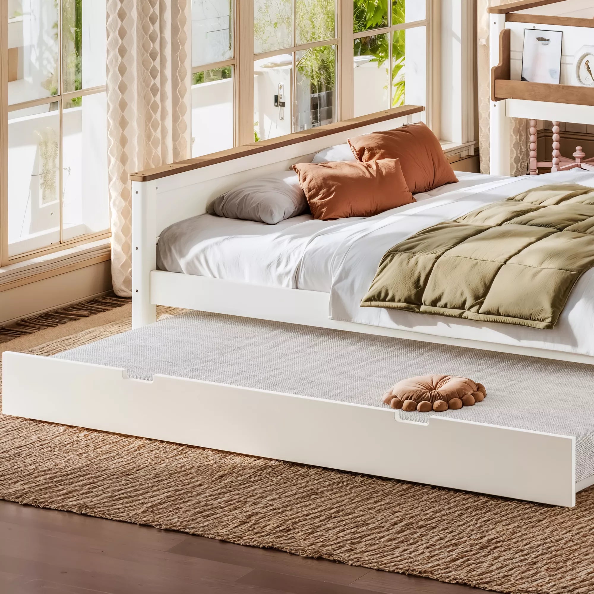 Pull-out trundle bed extended beneath wood bunk bed
