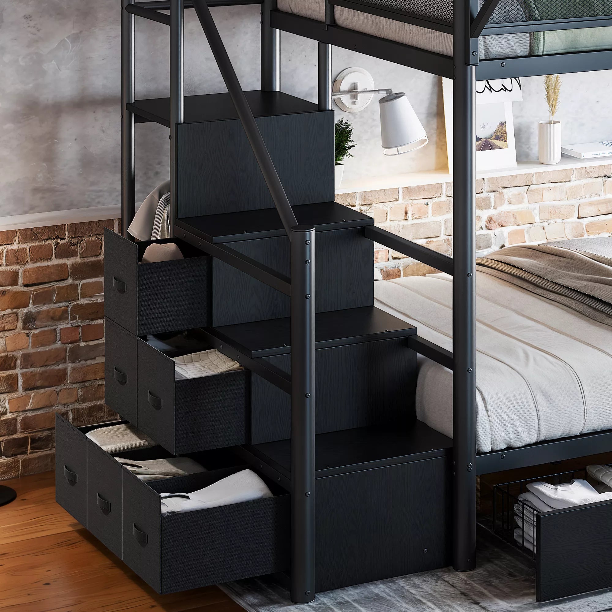 Close-up view of staircase cabinets and pull-out storage drawers on a black metal bunk bed