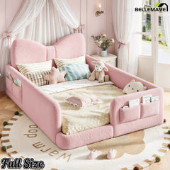 pink full size kids upholstered platform bed with bow headboard