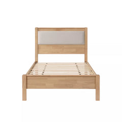 Wooden bed frame with upholstered headboard and slatted base, front view