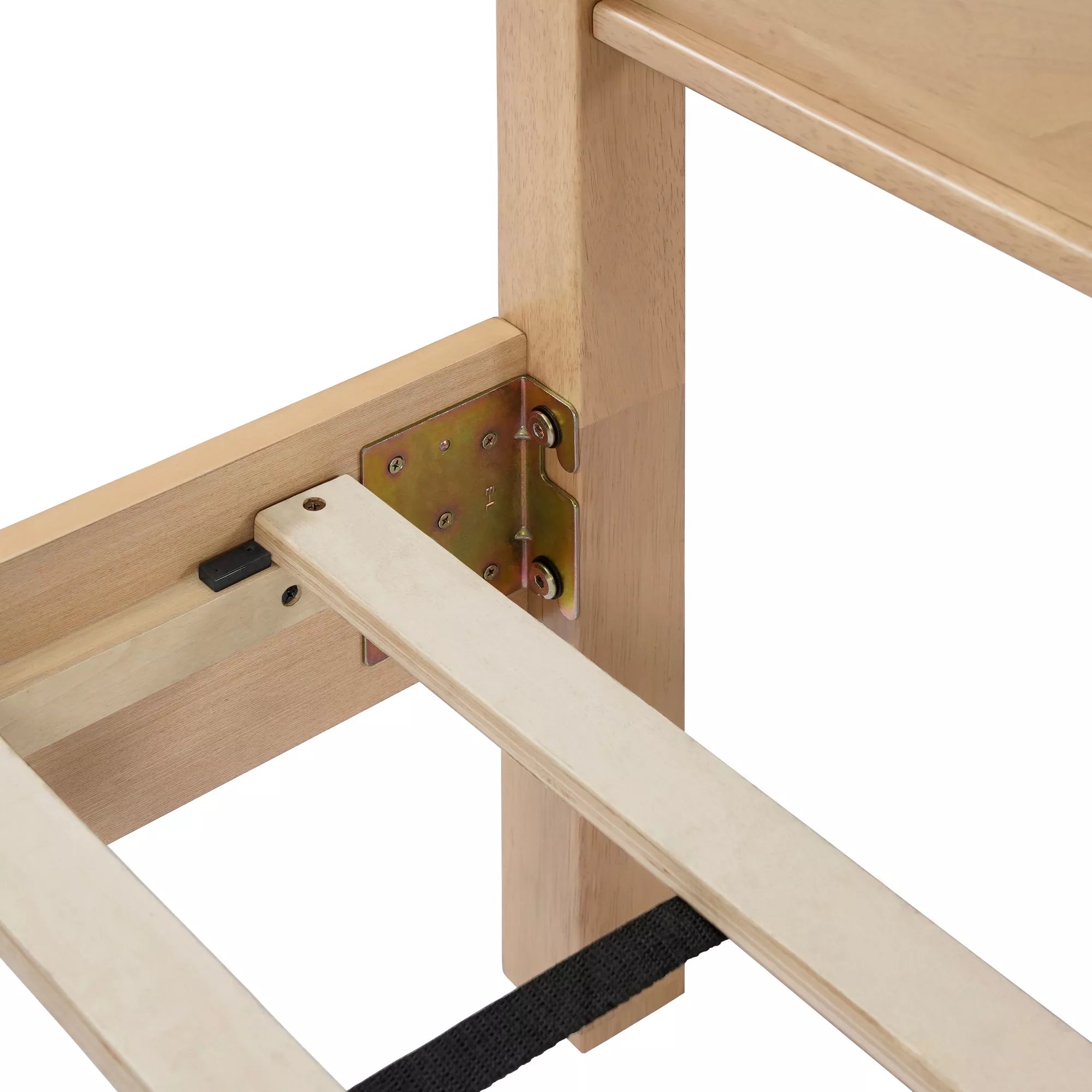 Close-up of a bed slat resting on the inner frame support