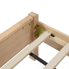 Wooden bed frame corner showing the rail connection and support hardware