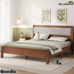 Brown Queen wooden bed with padded headboard and matching footboard