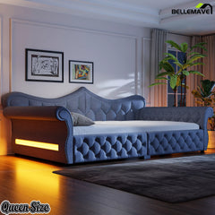 Gray upholstered daybed with warm LED accent lighting in a bedroom