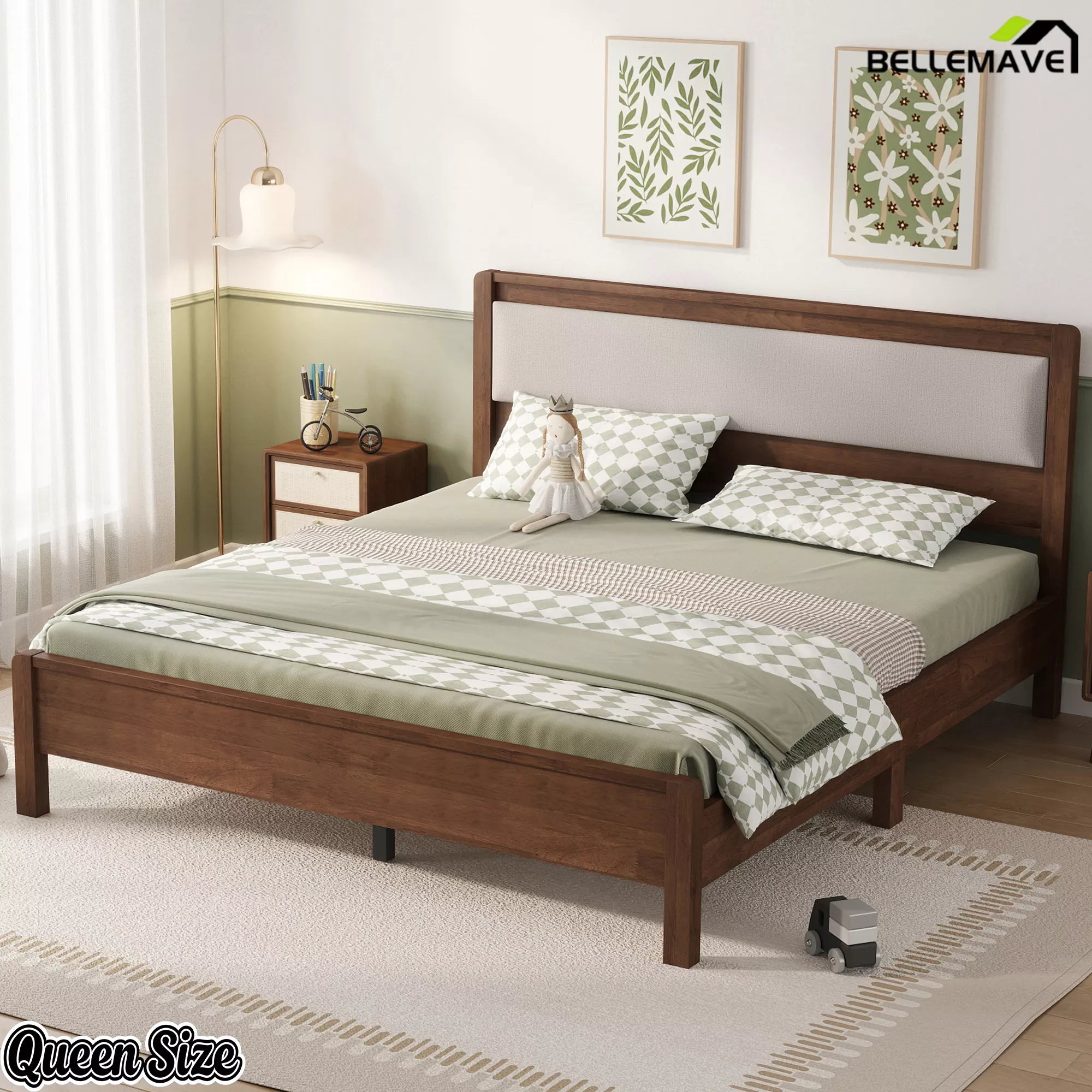 Dark wood Queen bed with upholstered headboard in a bedroom, angled view