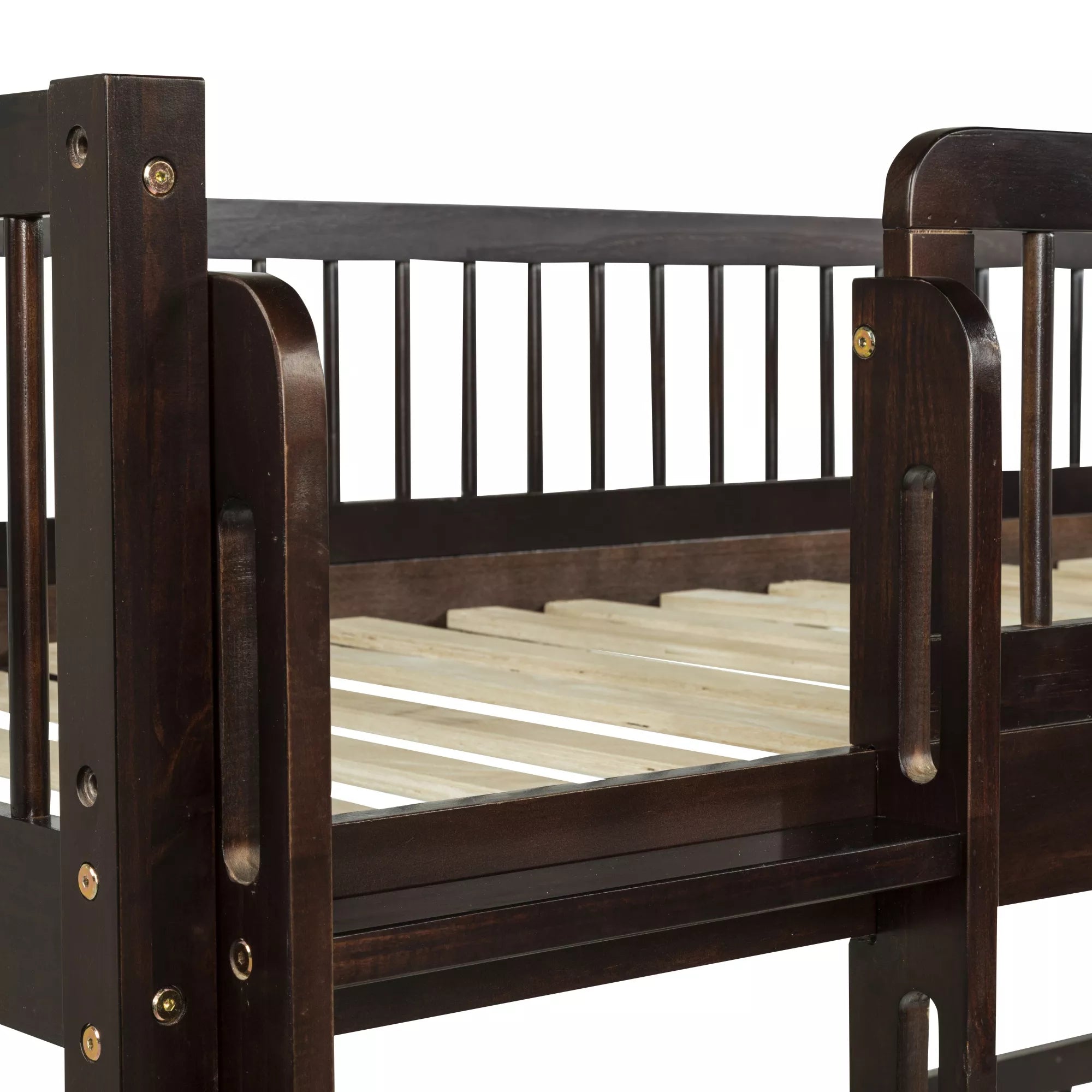Close-up of the lower bunk wooden guardrail and bed slats