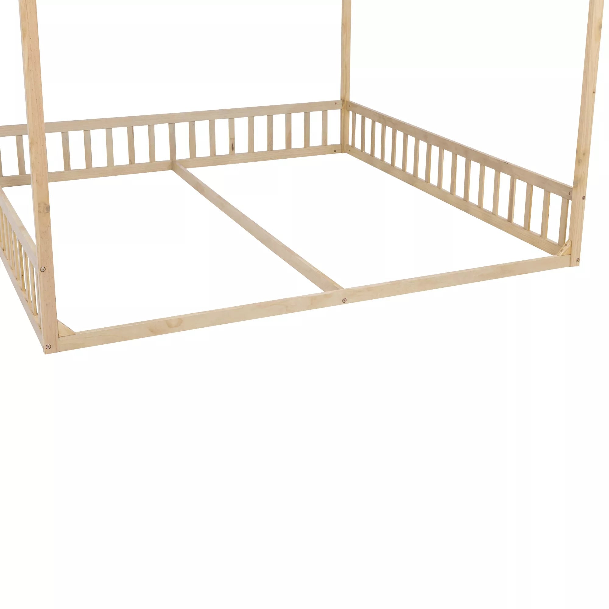 Twin floor bed with wooden safety guardrails