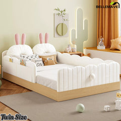 White twin bunny-themed upholstered platform bed in a child's bedroom