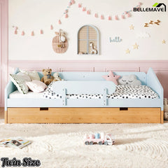 Twin floor bed with safety guardrails