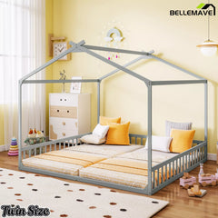 Twin house shaped floor bed with guardrails in bedroom