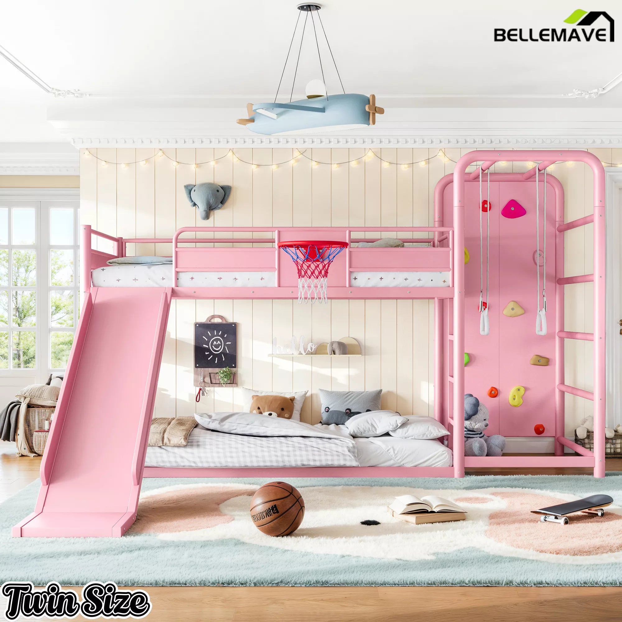 Pink twin loft bed with basketball hoop and slide design