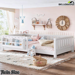White twin Montessori floor bed with built-in bookshelf