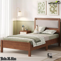 Brown Twin XL bed frame with upholstered headboard viewed from the side