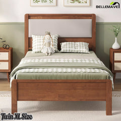 Front view of the brown Twin XL bed with padded headboard and wooden footboard