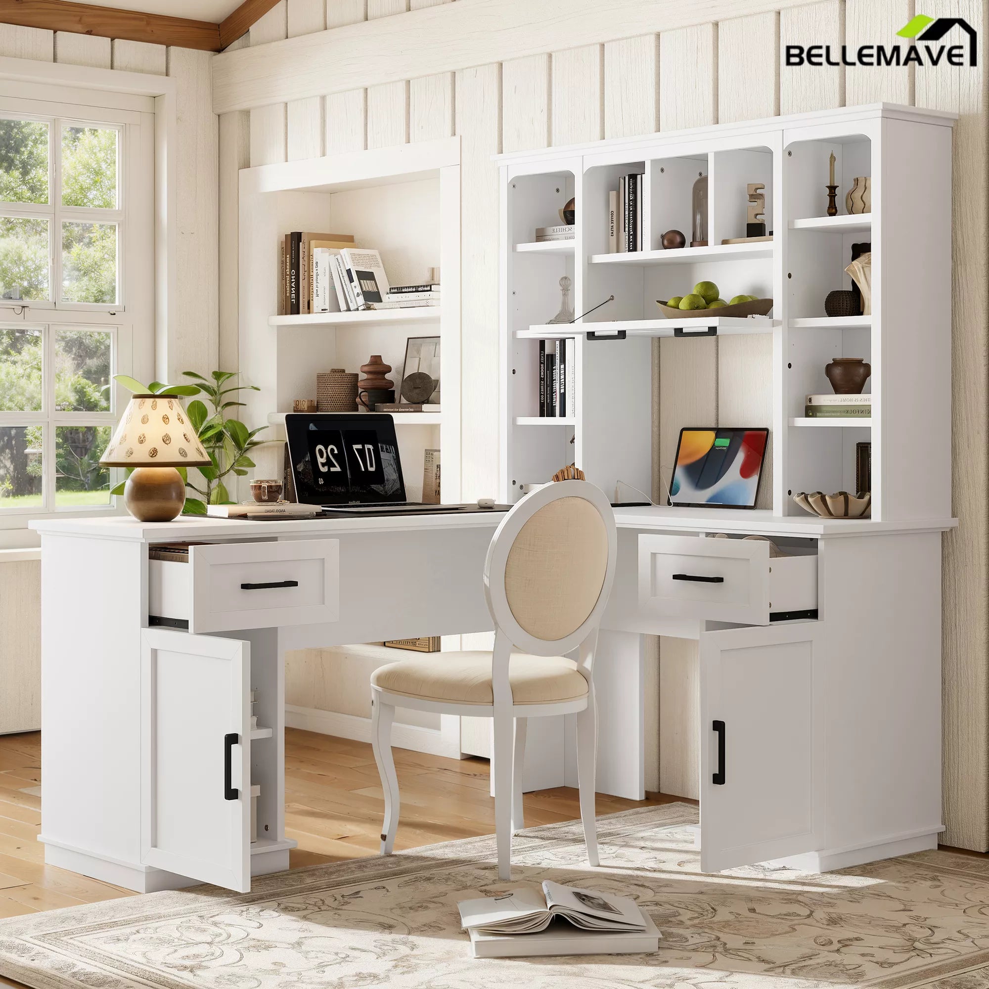 Front angled view of the white desk with drawers, cabinets, and open shelving