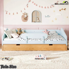 Twin floor bed with safety guardrails
