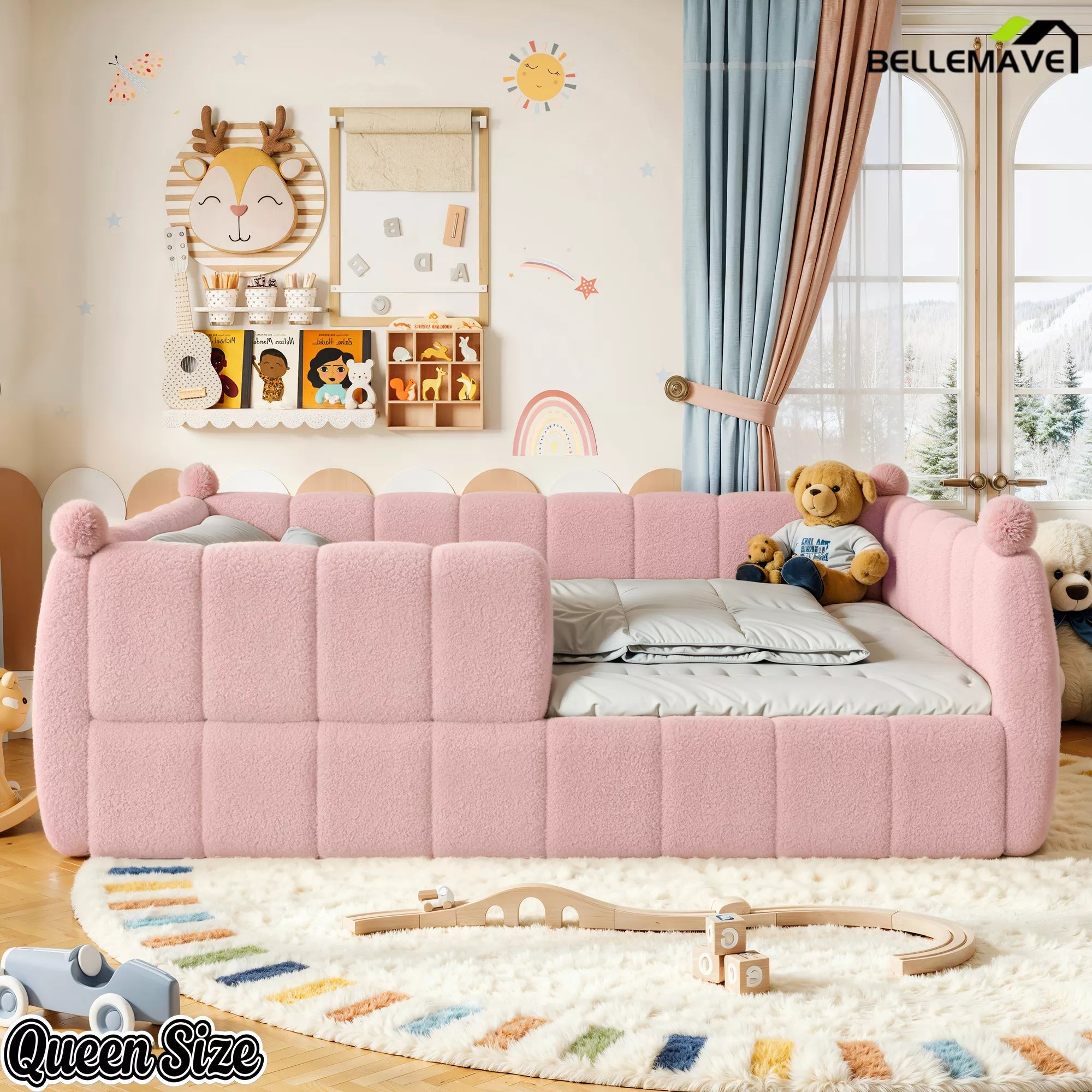 Pink queen floor bed shown from the front with rounded upholstered panels
