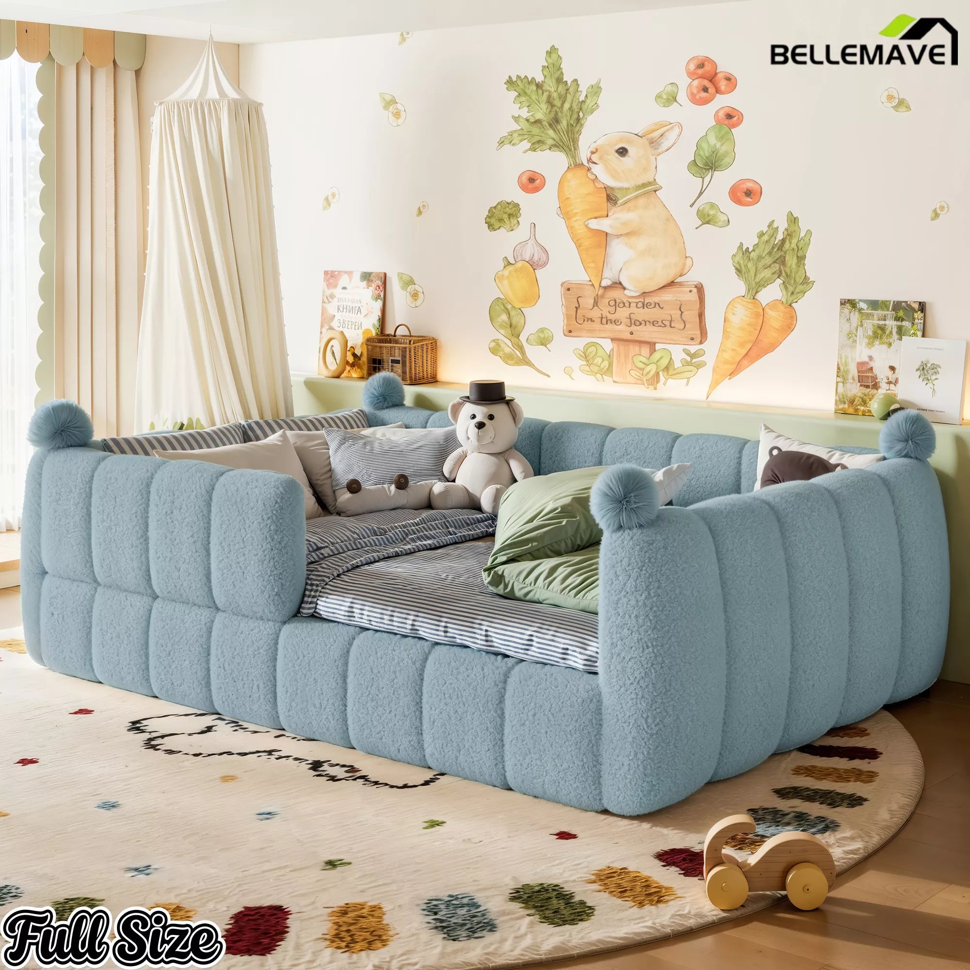 Blue kids floor bed displayed from the front with surrounding padded rails