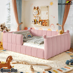 Pink upholstered queen floor bed viewed from an angled perspective