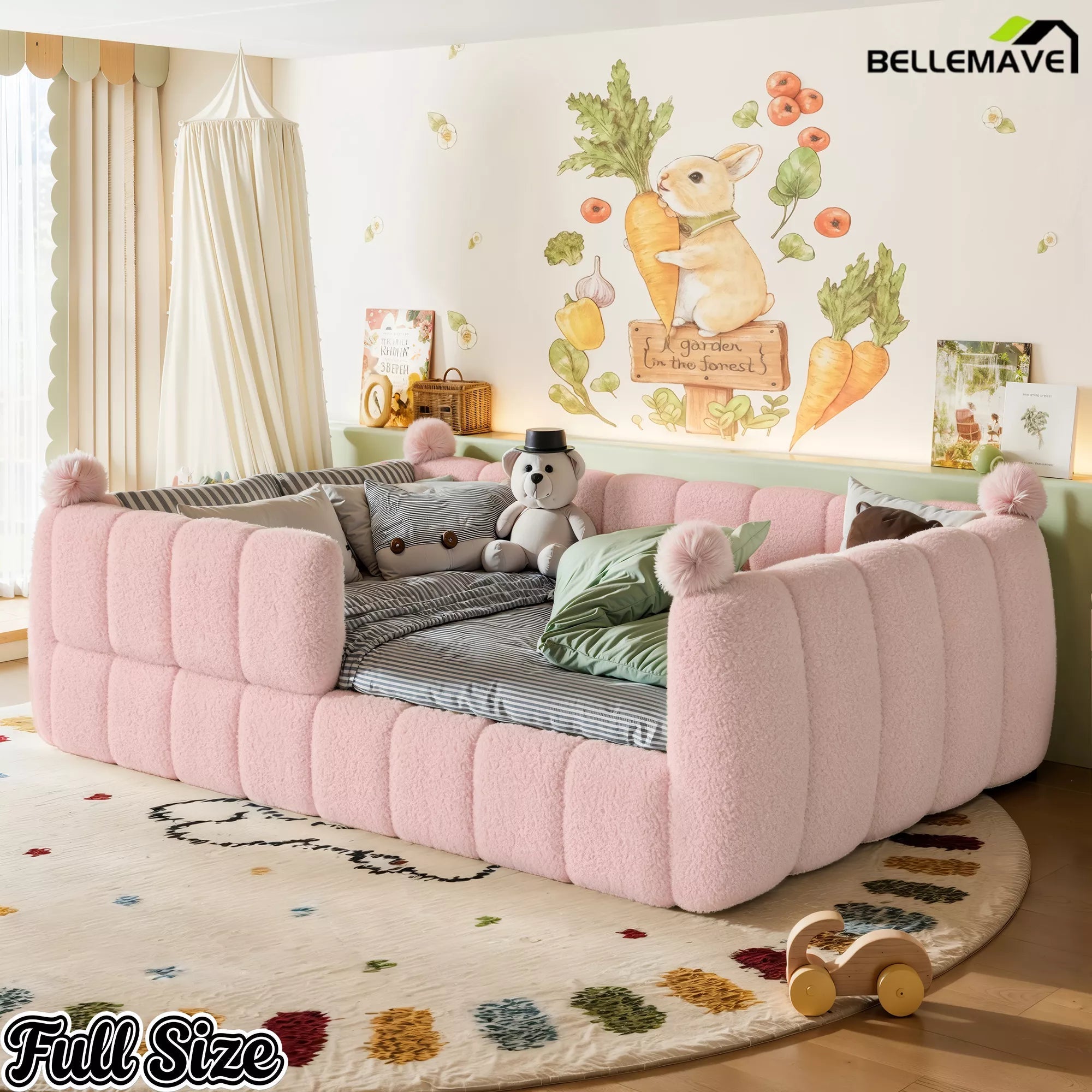 Pink full floor bed shown from an angled view with soft surrounding panels
