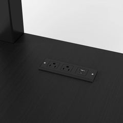 Close-up of the electrical outlet panel shown on the loft bed desktop