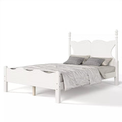 White platform bed with butterfly headboard and matching footboard in a styled bedroom