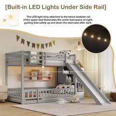 Gray twin over twin bunk bed with slide and built-in LED lights under the upper side rail