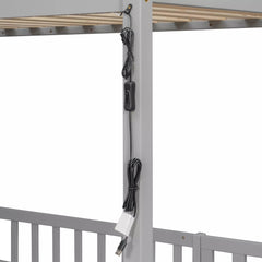Close-up of wiring routed along the upper bunk frame of a gray twin over twin bunk bed