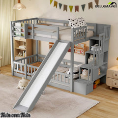 Angled view of gray twin over twin bunk bed with slide and storage staircase