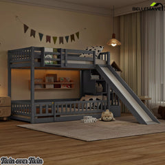 Gray twin over twin bunk bed with slide in a dimly lit bedroom