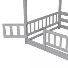 Close-up of the lower bunk guardrail gate and connecting post on a gray bunk bed