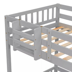Close-up of upper bunk guardrails and corner posts on a gray twin over twin bunk bed