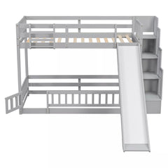 Gray twin over twin bunk bed with slide and storage stairs, showing the lower bunk guardrail gate