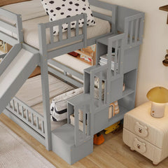 Gray bunk bed with storage staircase, bedside shelving and slide