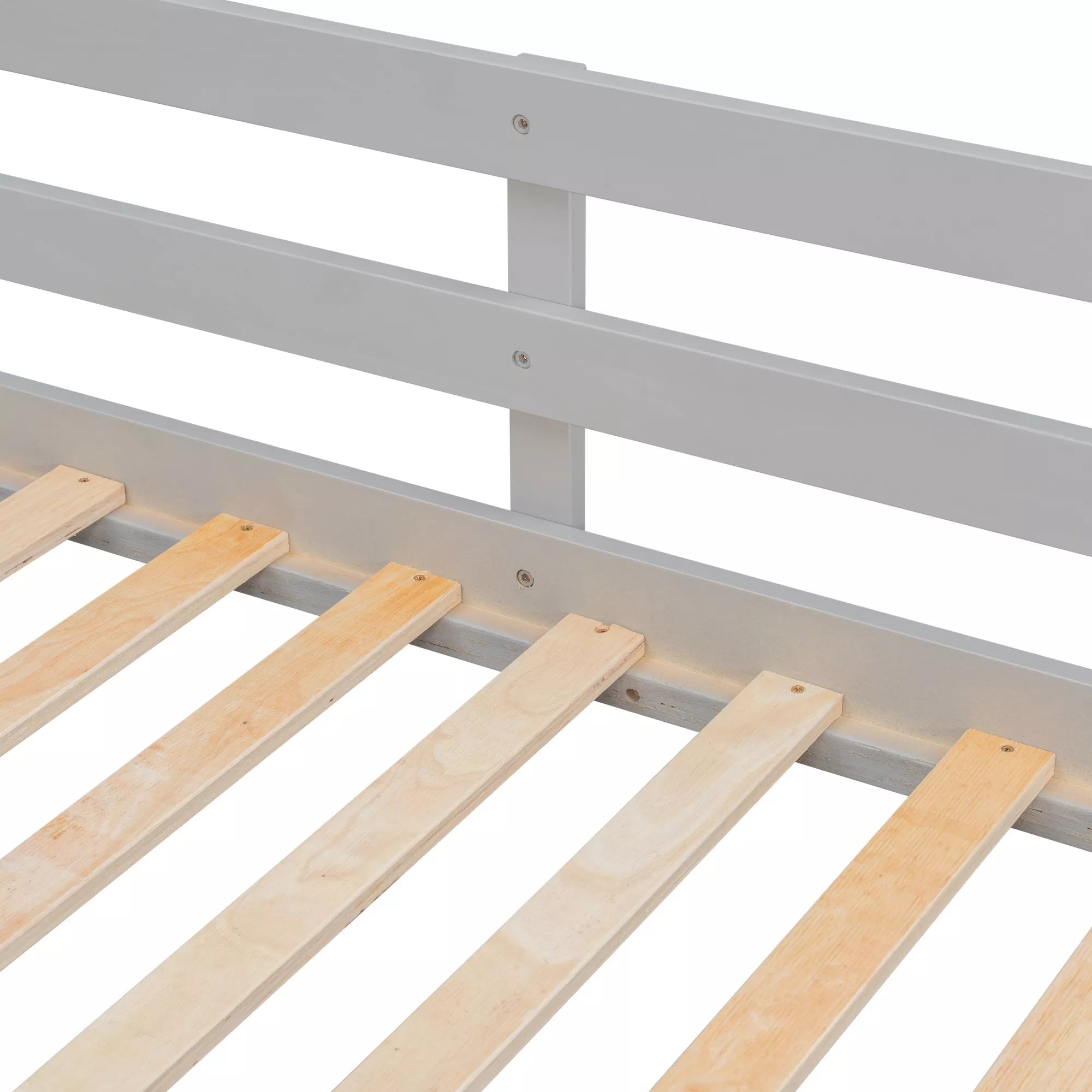 Close-up of wooden bed slats and side rail on a gray twin over twin bunk bed