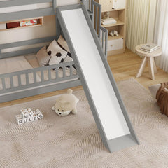Close-up view of the slide attached to a gray twin over twin bunk bed