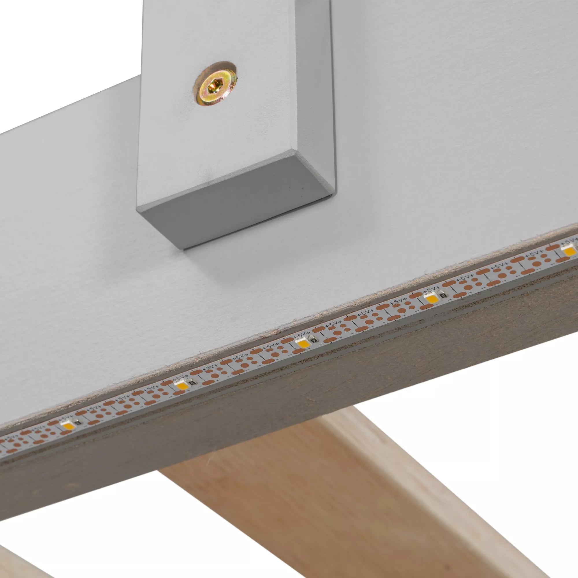 Close-up of the LED light strip and wooden bed slat support beneath the upper bunk