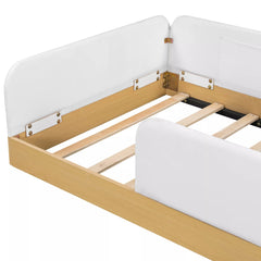 Close-up of upholstered guardrail connections and wood bed frame